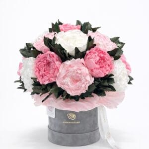 Peony Cloud preserved floral arrangement with blush and ivory peony-style flowers in a Maison Fleurie hat box
